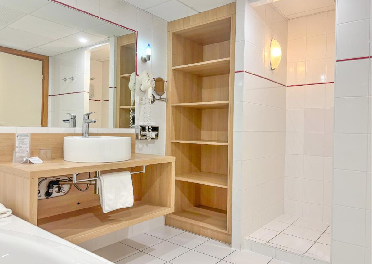 Salle de bains dans l'établissement Best Western Plus Hotel & SPA Le Schoenenbourg