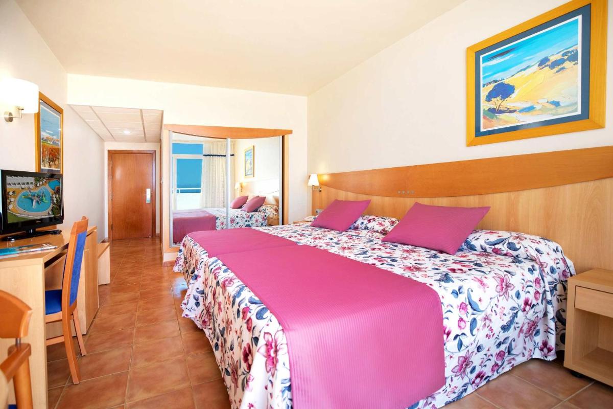 Cama o camas de una habitación en Hotel Servigroup Marina Mar