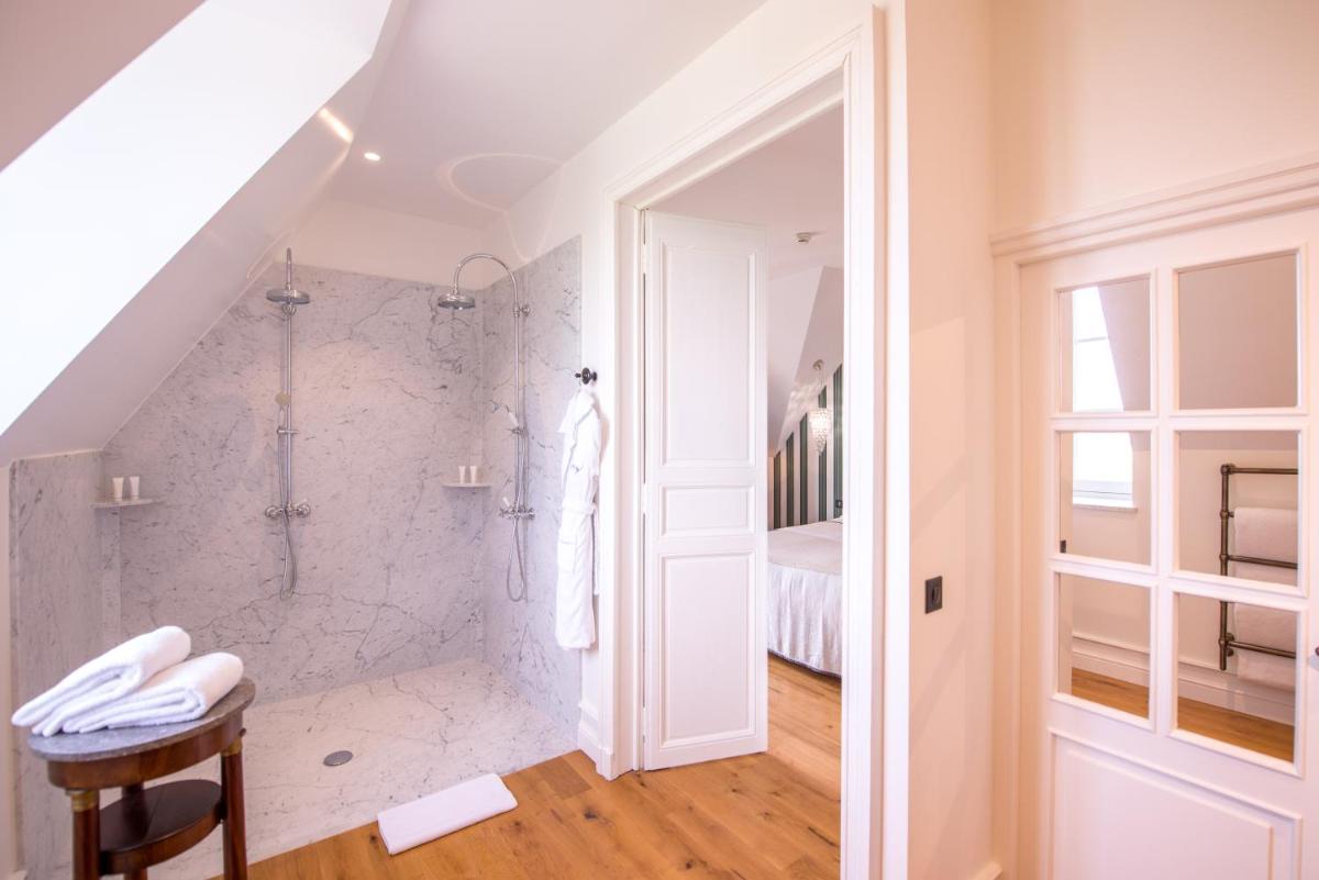 Salle de bains dans l'établissement Chateau de Sacy