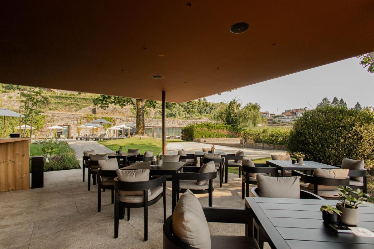 Um restaurante ou outro lugar para comer em Casa da Calçada