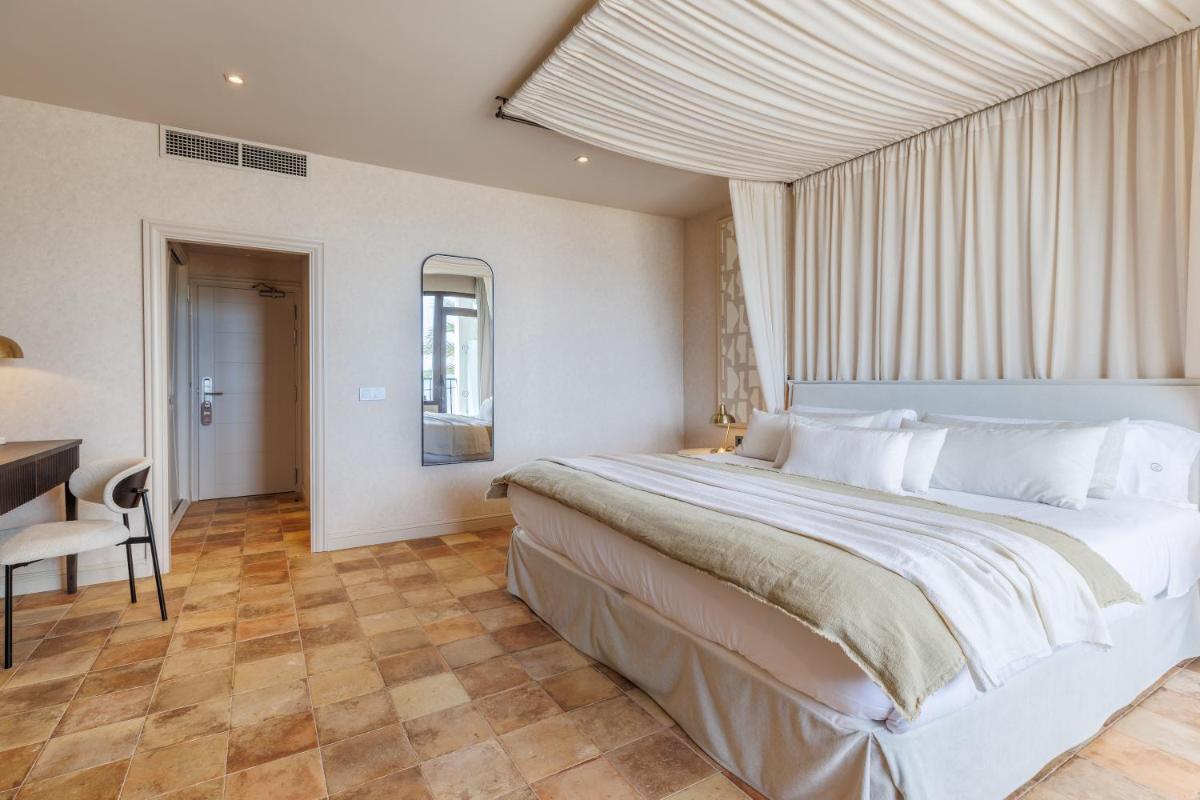 Cama o camas de una habitación en Hoposa Uyal