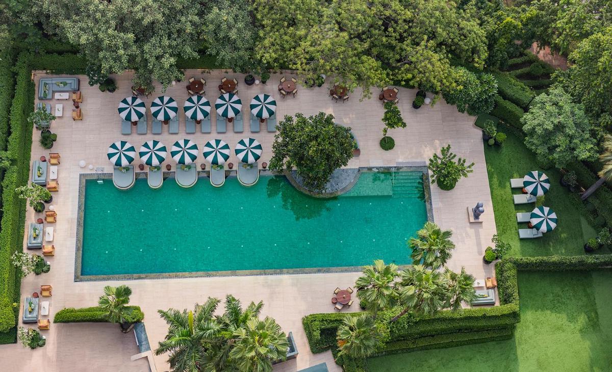 an overhead view of a swimming pool at a resort at Shangri-La Eros New Delhi in New Delhi an overhead view of a swimming pool at a resort at Shangri-La Eros New Delhi in New Delhi