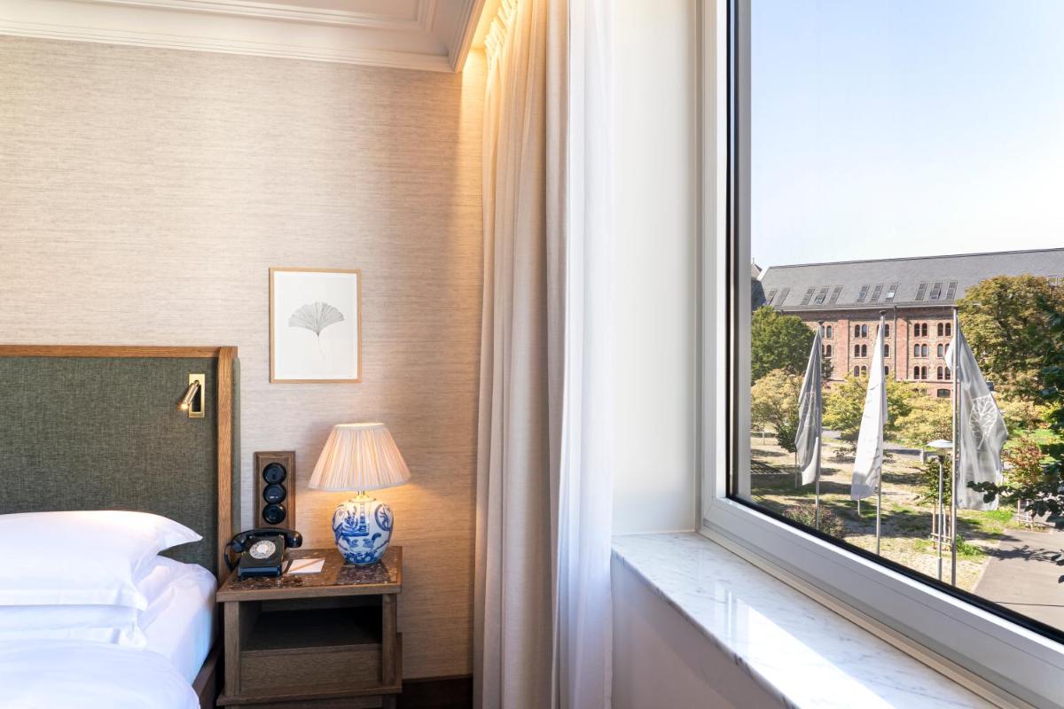 Ein Bett oder Betten in einem Zimmer der Unterkunft Brunfels Hotel, in the Unbound Collection by Hyatt