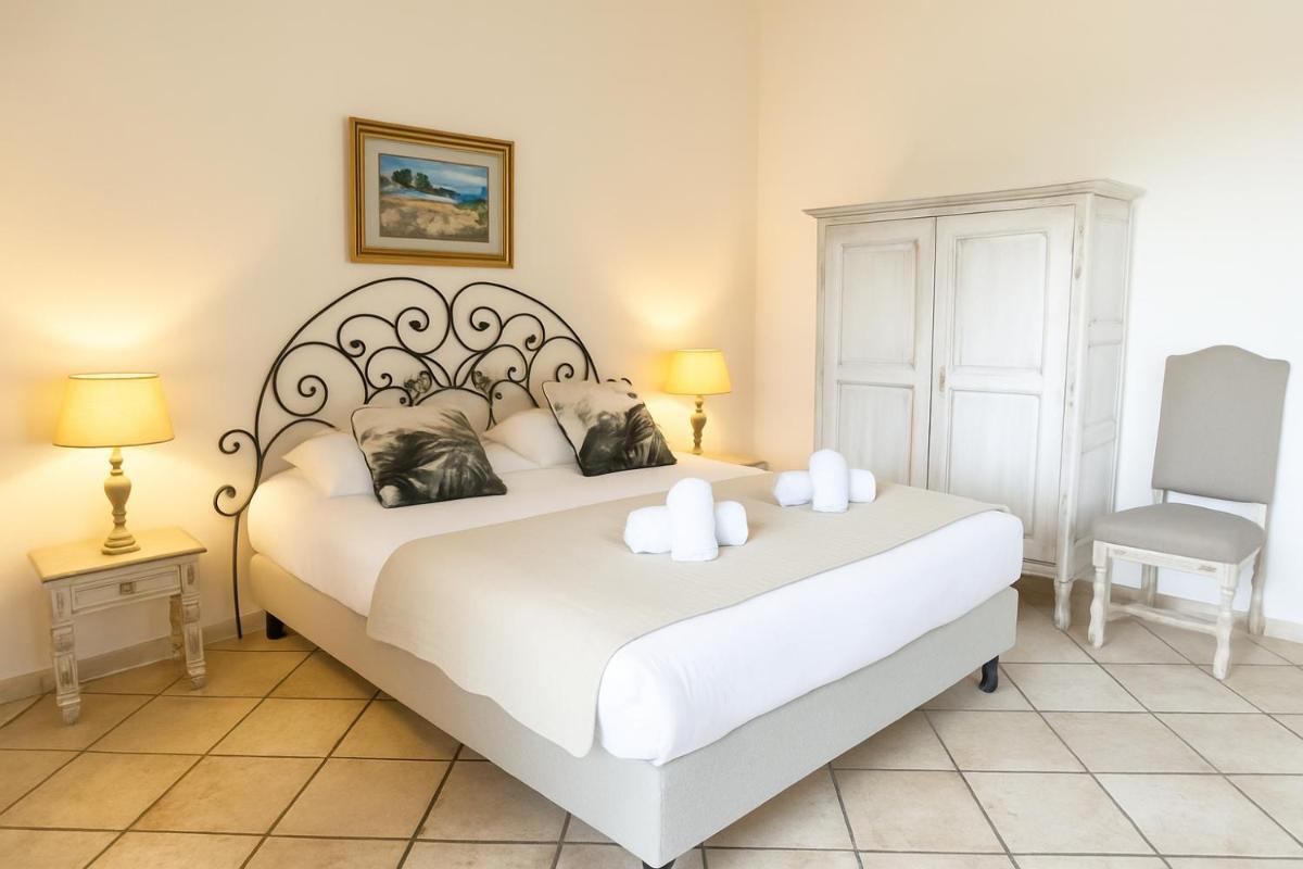 Un ou plusieurs lits dans un hébergement de l'établissement La Solenzara hôtel - 3 Etoiles Supérieur - Appartement & SPA