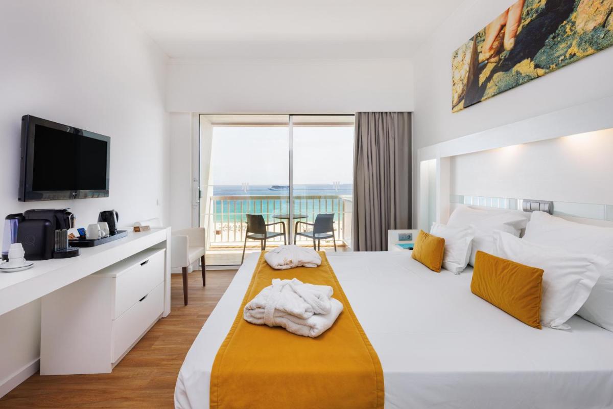 Uma cama ou camas num quarto em Jupiter Algarve Hotel - Beach & Spa
