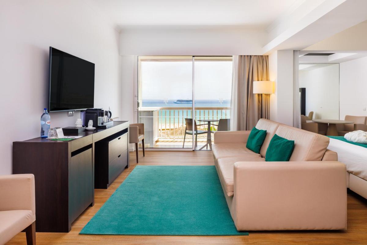 Uma área de estar em Jupiter Algarve Hotel - Beach & Spa