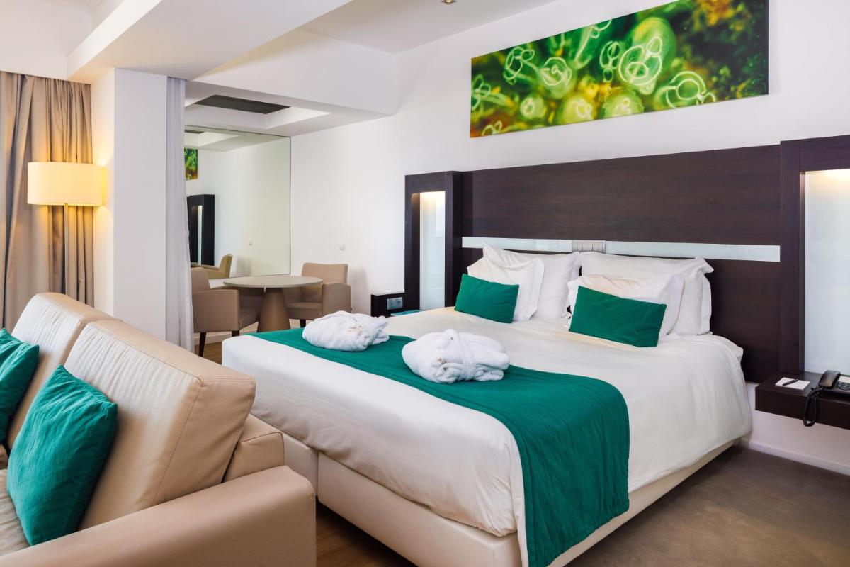 Uma cama ou camas num quarto em Jupiter Algarve Hotel - Beach & Spa
