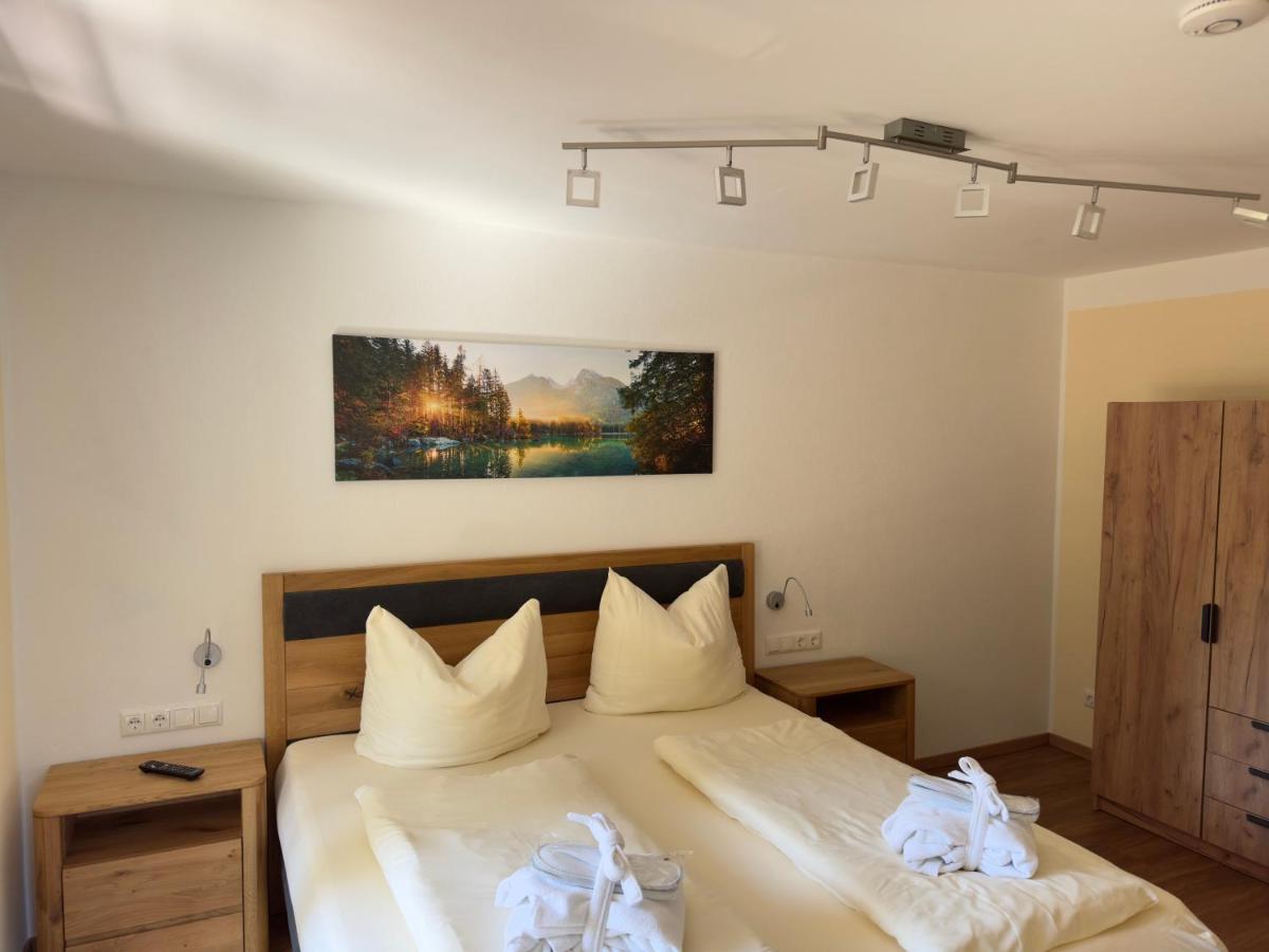 Ein Bett oder Betten in einem Zimmer der Unterkunft Alpenglühn Apartments - Adult Only