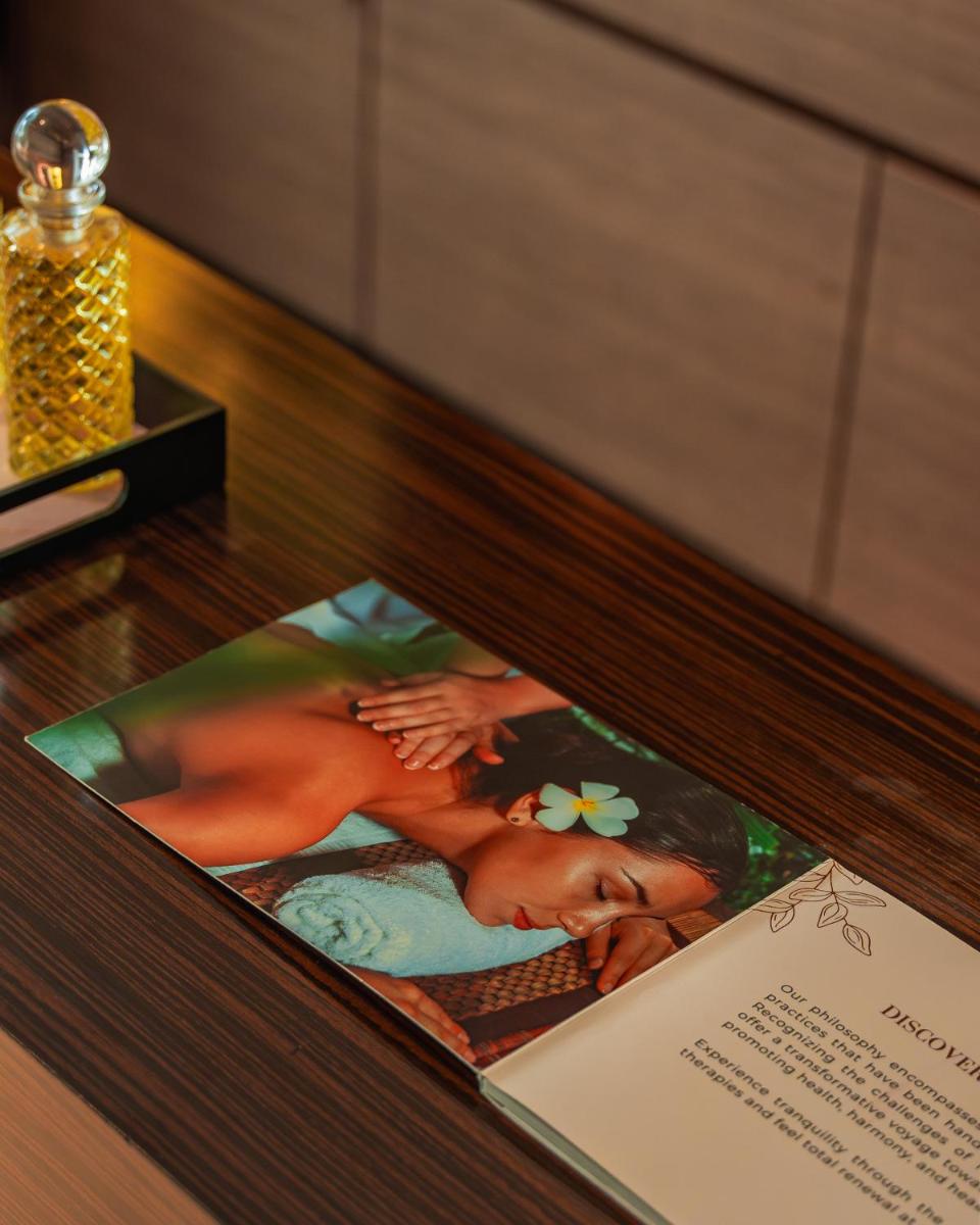 a display case with a picture of a woman at Hyatt Pune in Pune