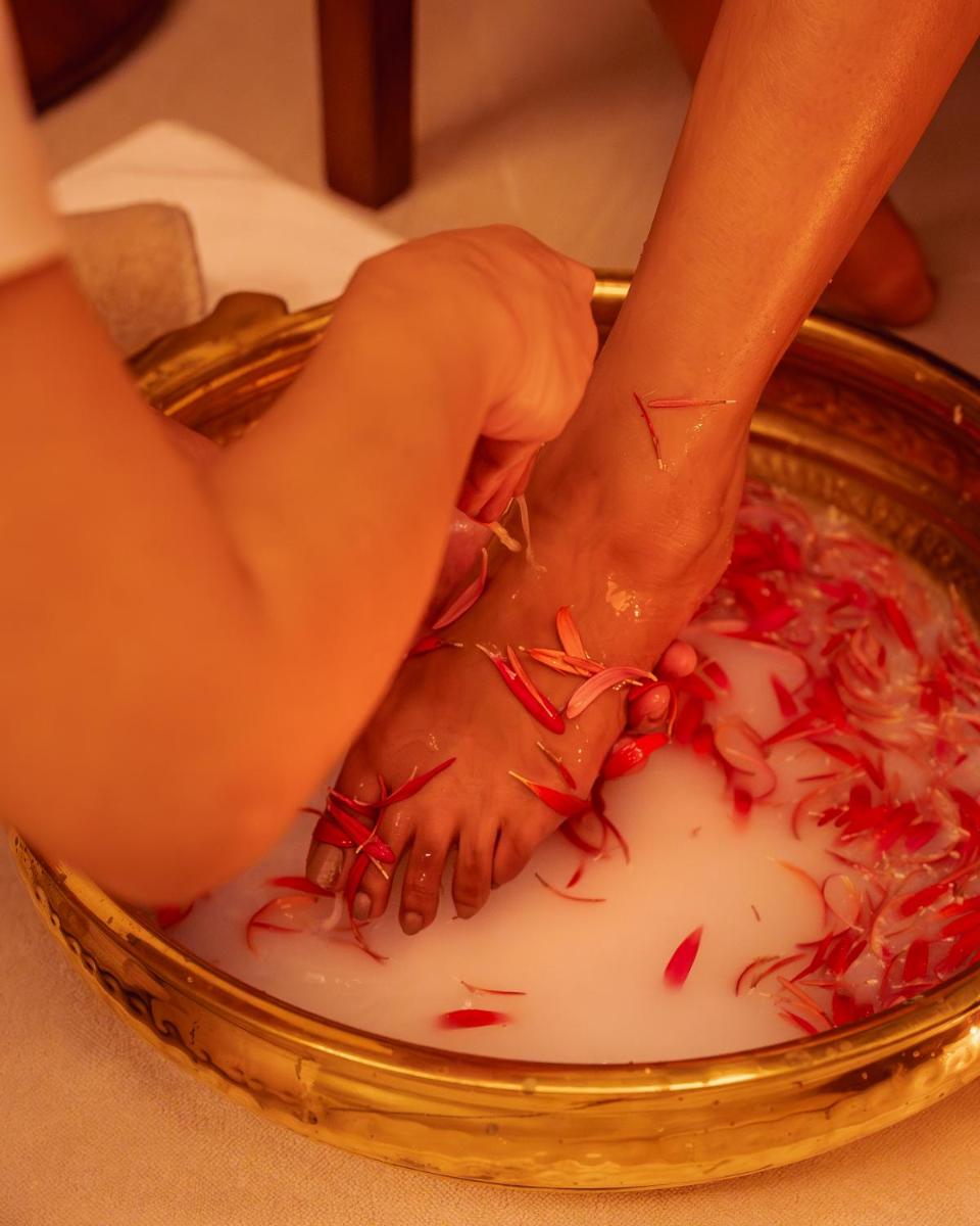 two people washing their hands in a bowl of blood at Hyatt Pune in Pune