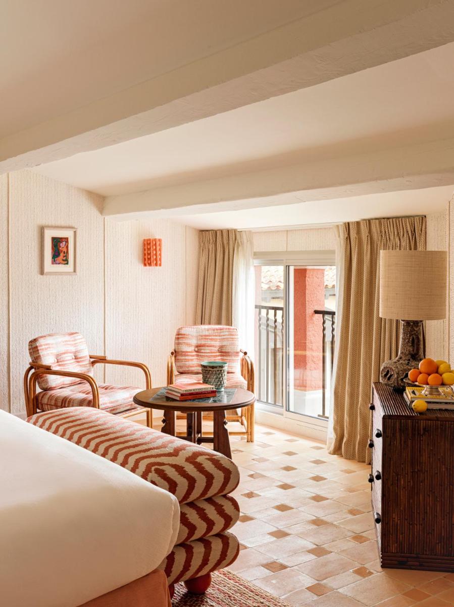 Un ou plusieurs lits dans un hébergement de l'établissement Hotel Byblos Saint-Tropez