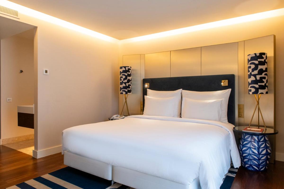 Uma cama ou camas num quarto em Palácio do Governador - Lisbon Hotel & Spa
