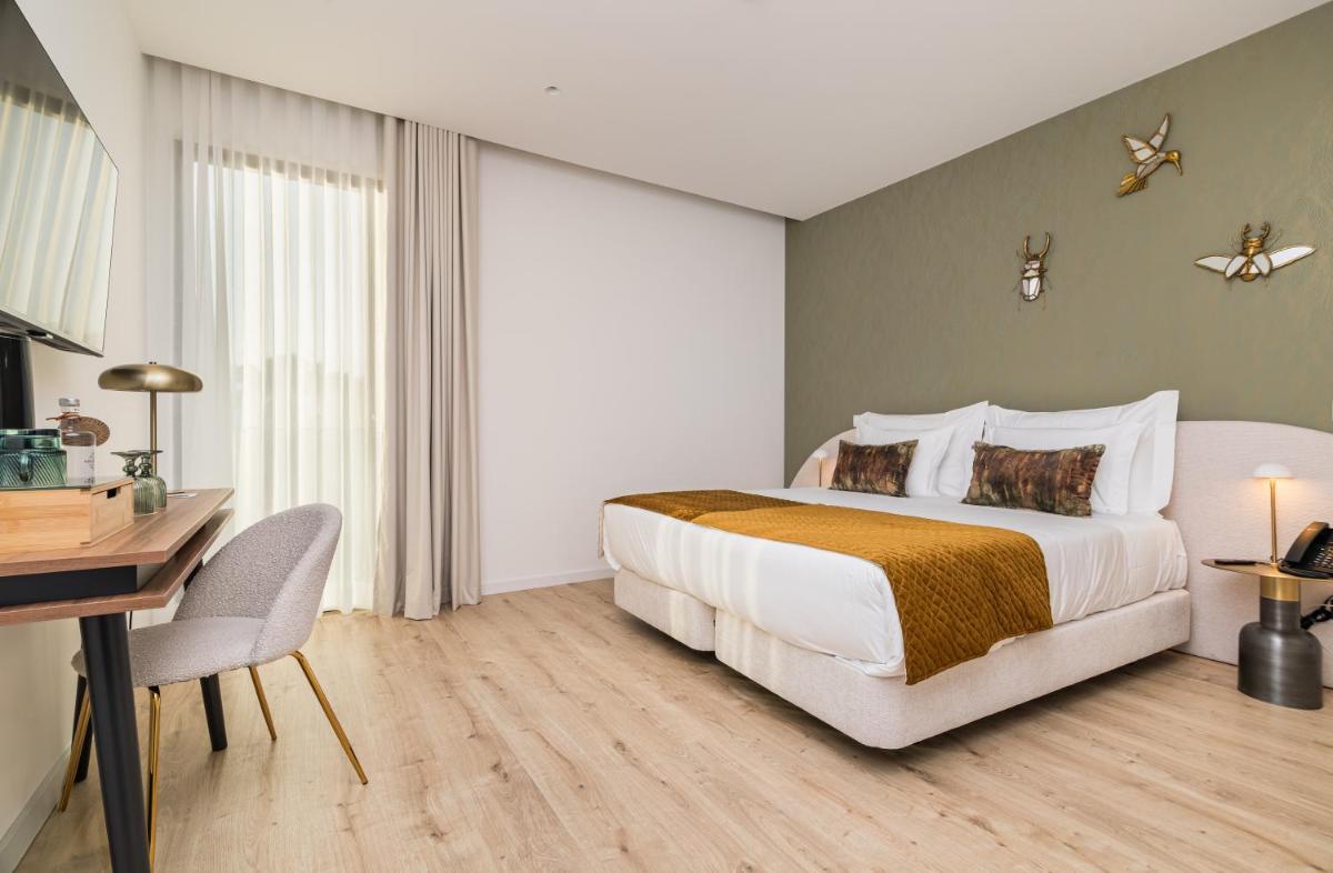 Uma cama ou camas num quarto em Haven Nature Hotel & Villas