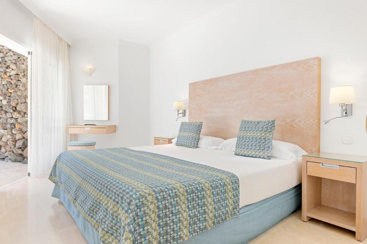 Cama o camas de una habitación en Anfi del Mar 1