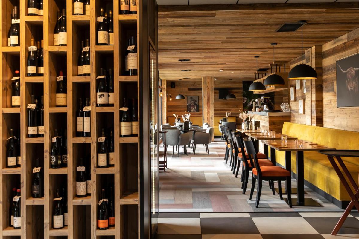 Restaurant ou autre lieu de restauration dans l'établissement Résidence Odalys Mendi Alde