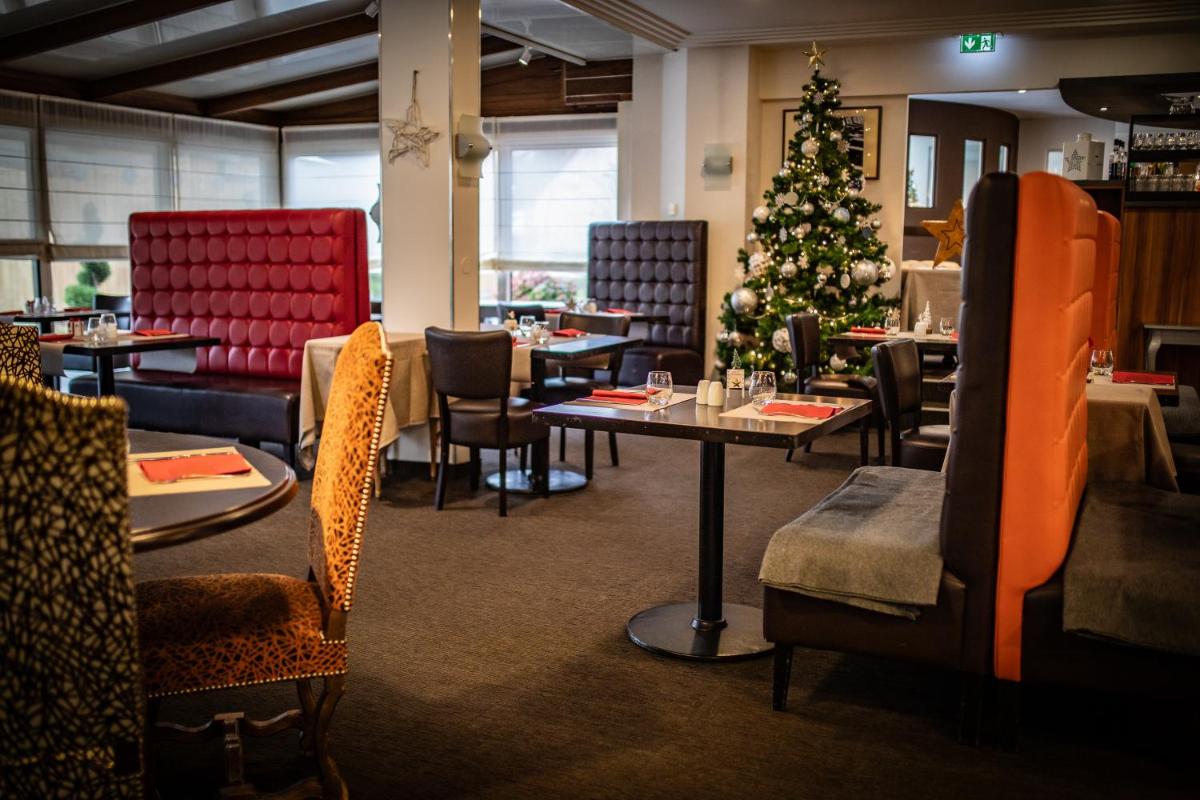 Coin salon dans l'établissement Europe Haguenau – Hotel & Spa