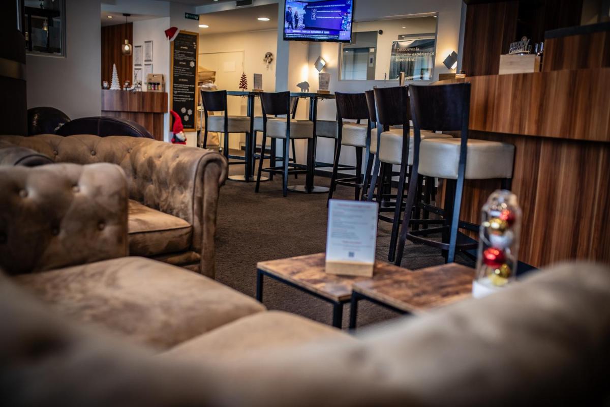Coin salon dans l'établissement Europe Haguenau – Hotel & Spa