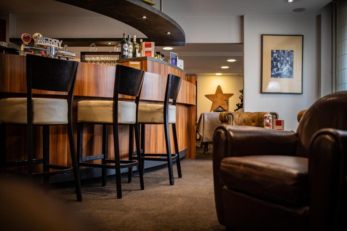 Coin salon dans l'établissement Europe Haguenau – Hotel & Spa
