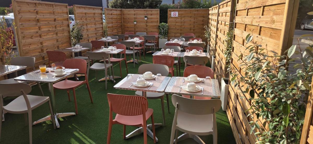 Restaurant ou autre lieu de restauration dans l'établissement Forme-hotel & Spa Montpellier Sud-Est - Parc Expositions - Arena