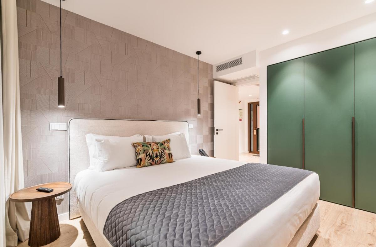 Uma cama ou camas num quarto em Haven Nature Hotel & Villas