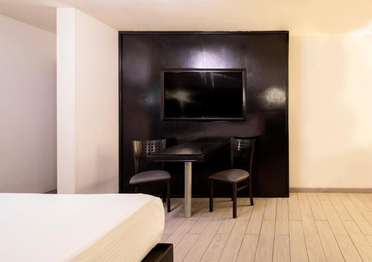 Motel Olimpo - Housity