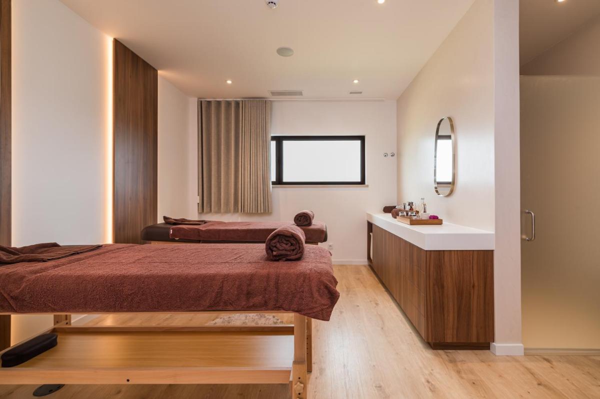 Uma cama ou camas num quarto em Haven Nature Hotel & Villas