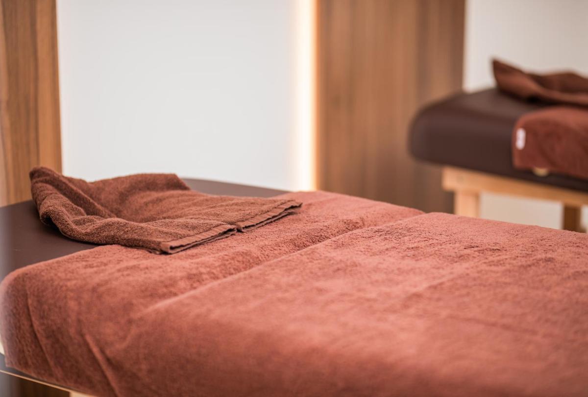 Uma cama ou camas num quarto em Haven Nature Hotel & Villas