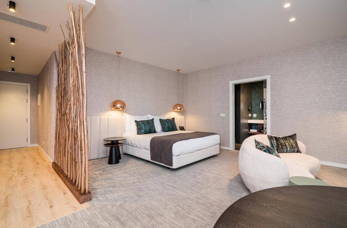 Uma cama ou camas num quarto em Haven Nature Hotel & Villas