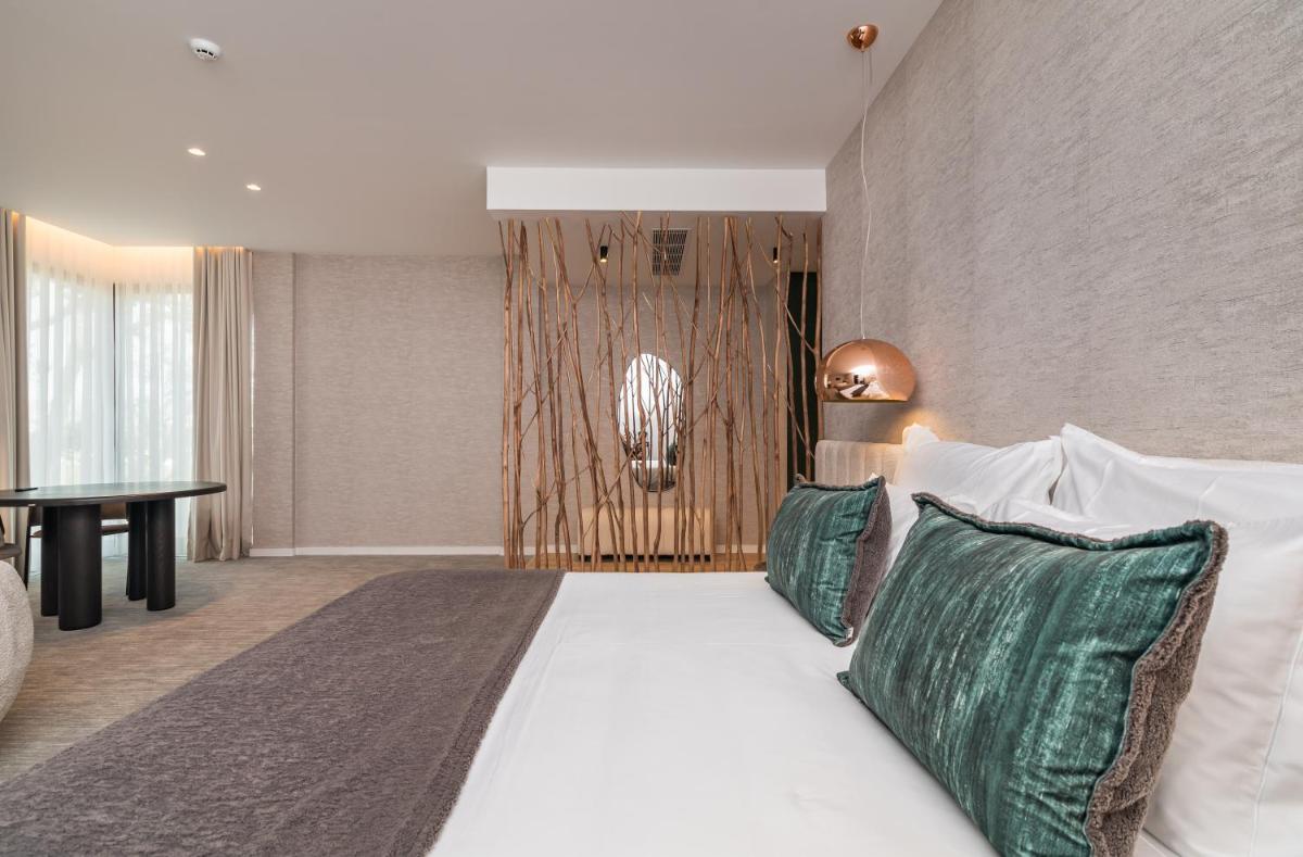 Uma cama ou camas num quarto em Haven Nature Hotel & Villas