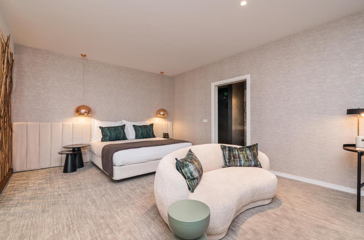 Uma cama ou camas num quarto em Haven Nature Hotel & Villas