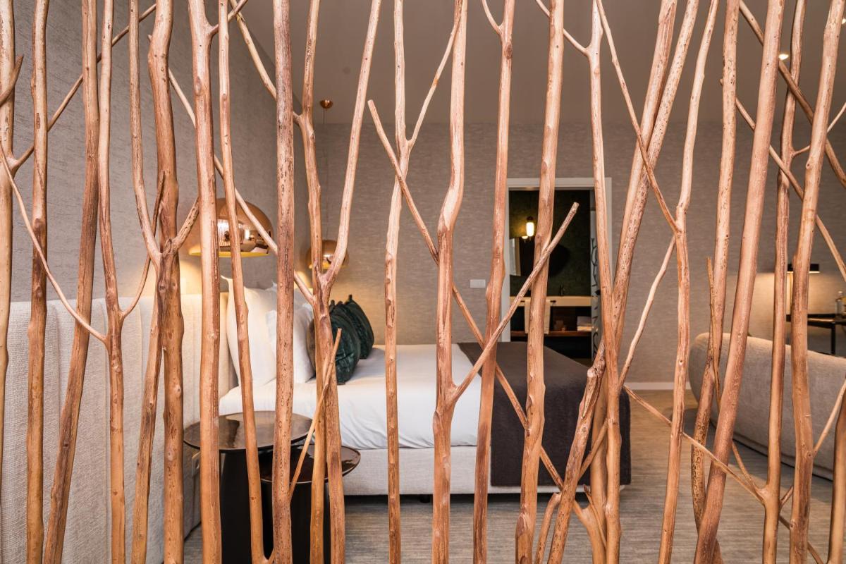 Uma cama ou camas num quarto em Haven Nature Hotel & Villas
