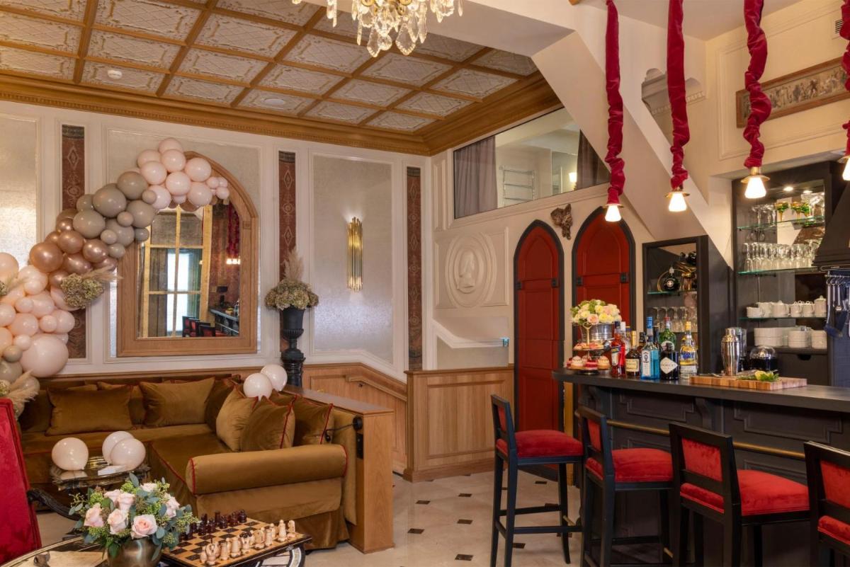 Coin salon dans l'établissement Hôtel Da Vinci & Spa
