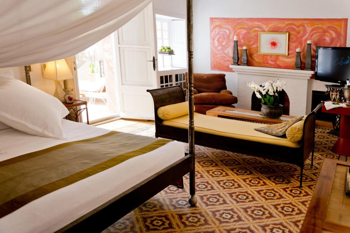 Cama o camas de una habitación en Hotel Can Roses