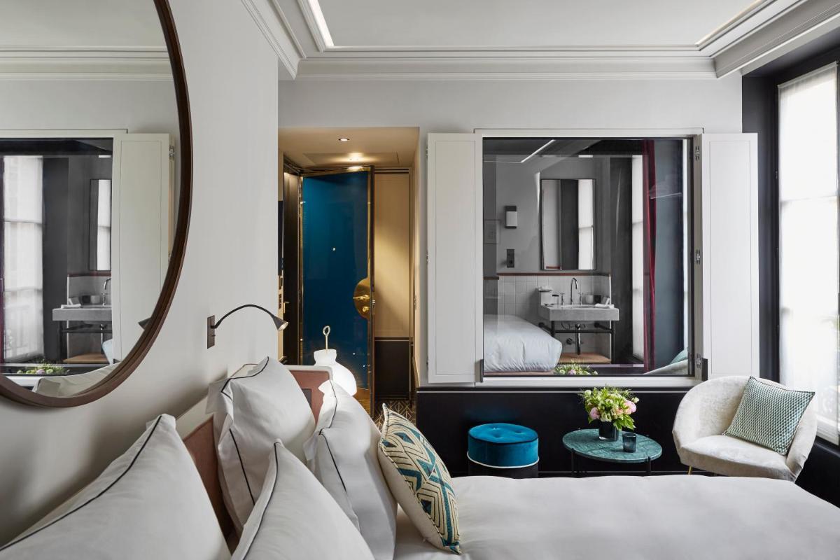 Coin salon dans l'établissement Le Roch Hotel & Spa