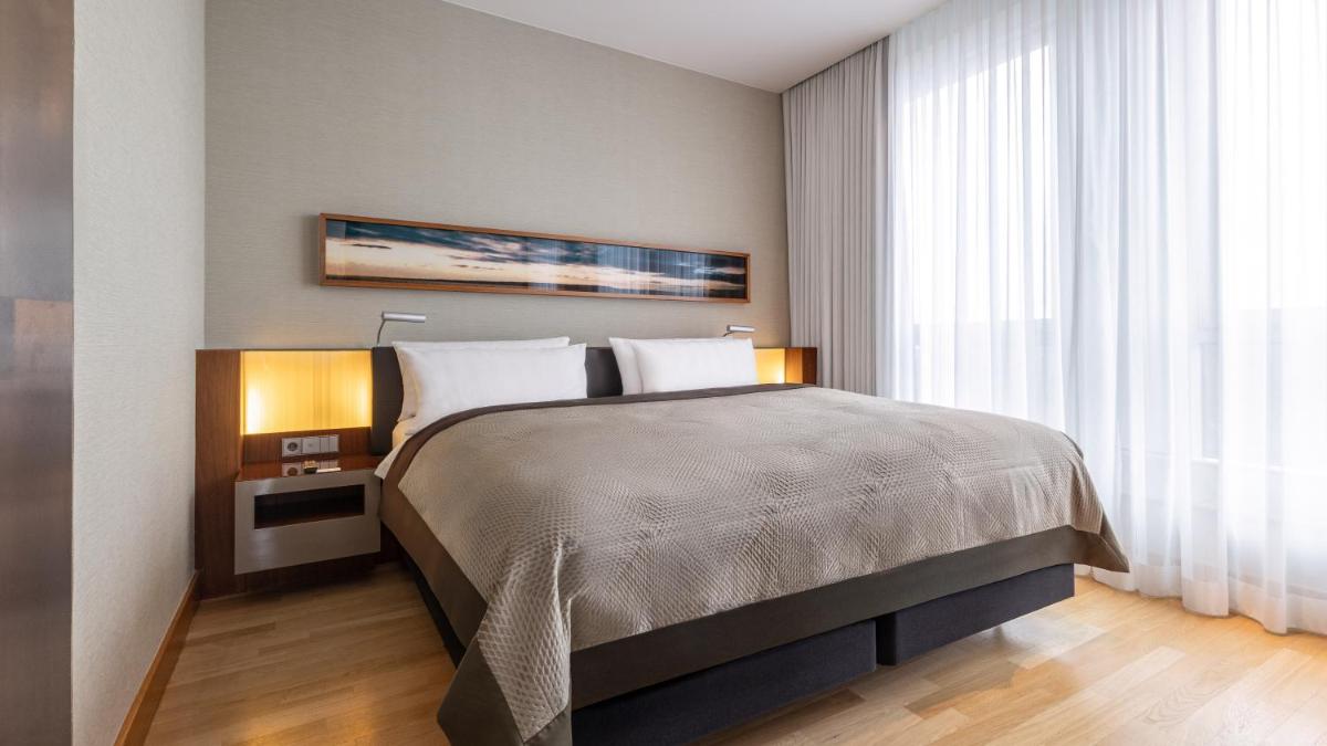 Ein Bett oder Betten in einem Zimmer der Unterkunft InterContinental Berlin by IHG
