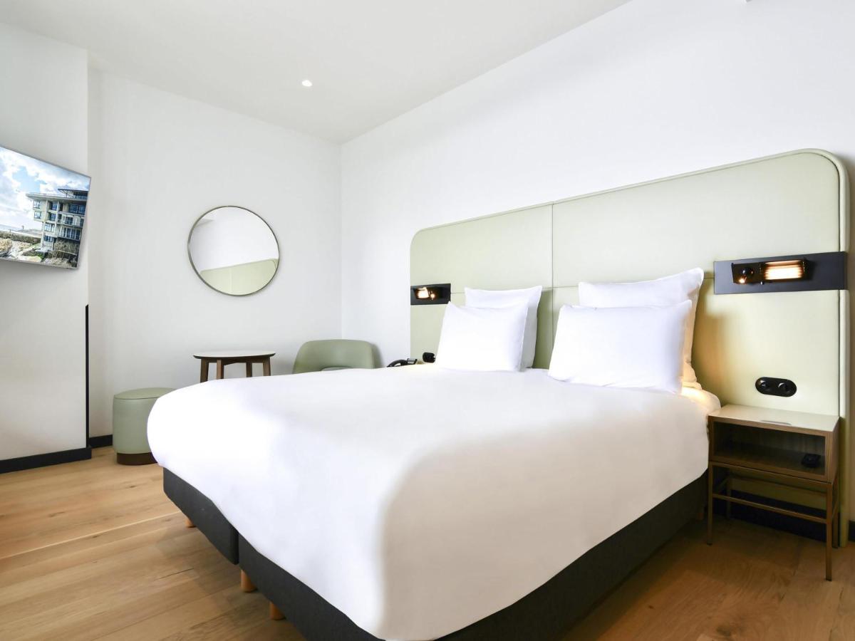 Un ou plusieurs lits dans un hébergement de l'établissement Sainte-Barbe Hotel & Spa Le Conquet - MGallery Collection