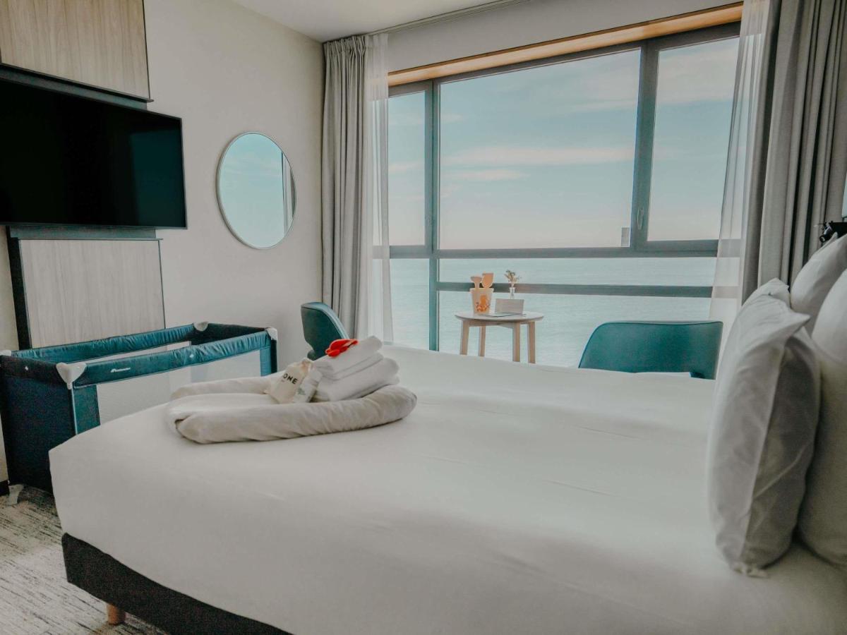 Un ou plusieurs lits dans un hébergement de l'établissement Sainte-Barbe Hotel & Spa Le Conquet - MGallery Collection