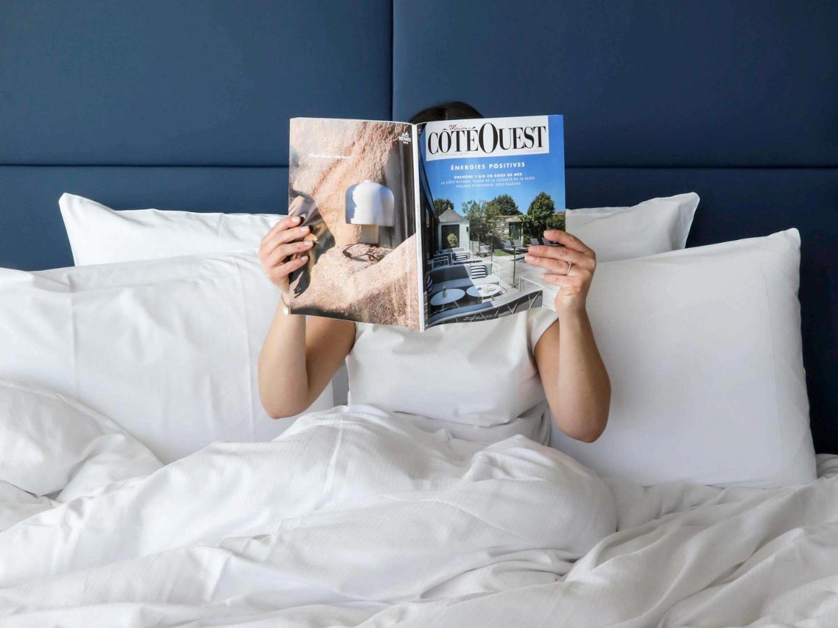 Un ou plusieurs lits dans un hébergement de l'établissement Sainte-Barbe Hotel & Spa Le Conquet - MGallery Collection