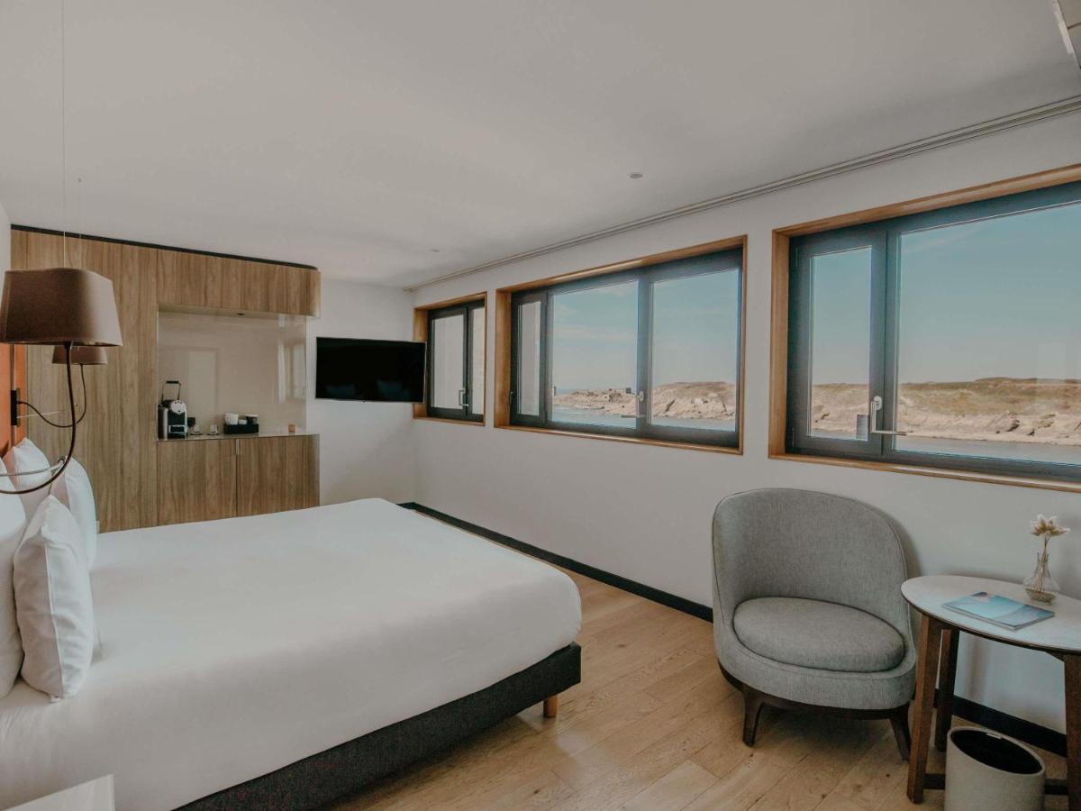 Un ou plusieurs lits dans un hébergement de l'établissement Sainte-Barbe Hotel & Spa Le Conquet - MGallery Collection