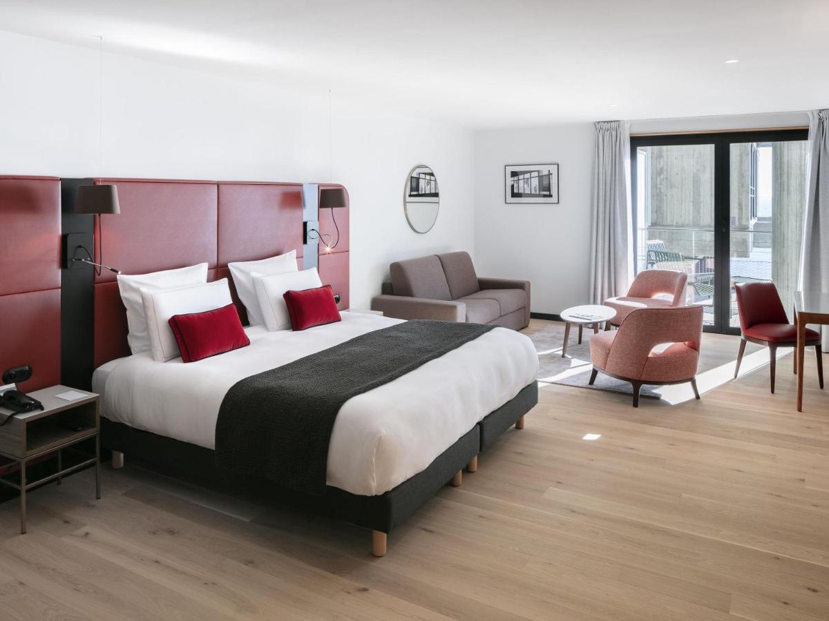Un ou plusieurs lits dans un hébergement de l'établissement Sainte-Barbe Hotel & Spa Le Conquet - MGallery Collection