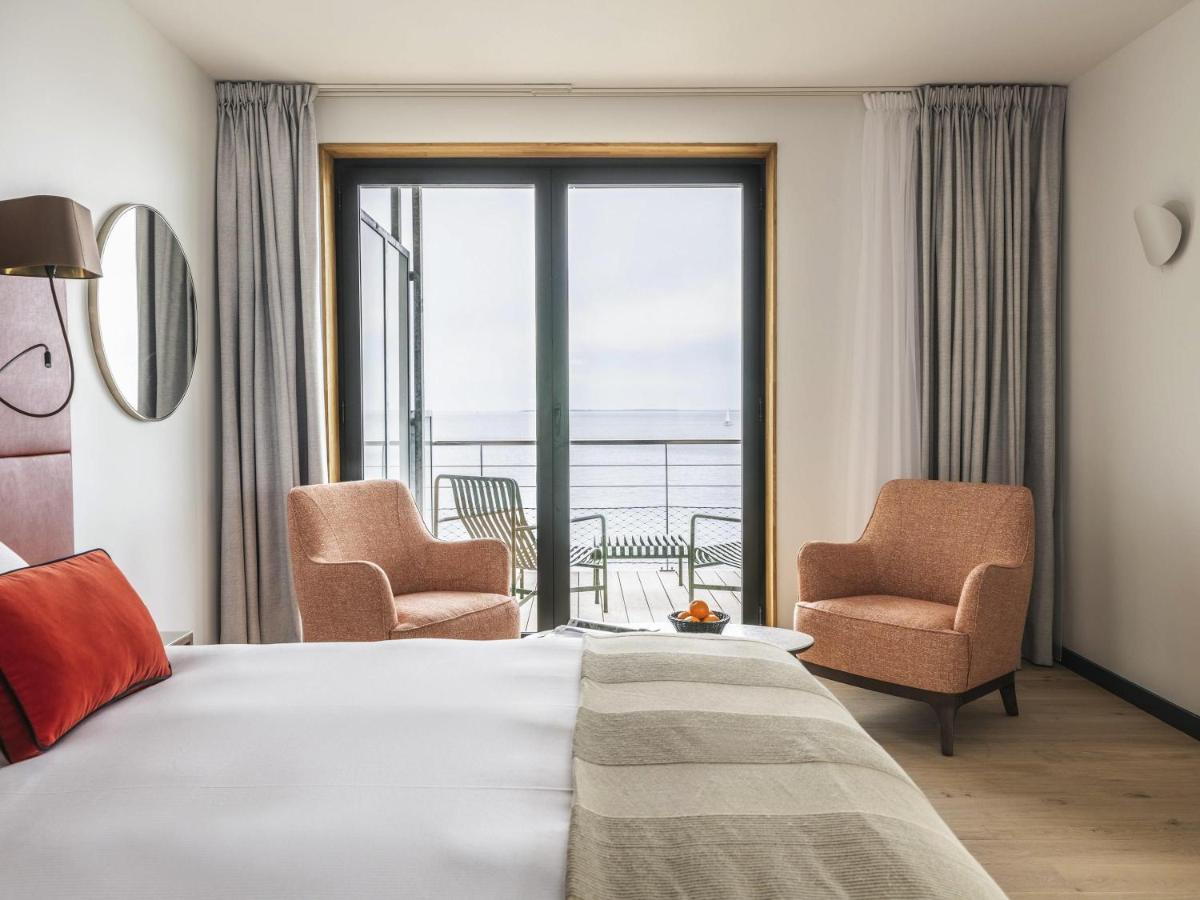 Un ou plusieurs lits dans un hébergement de l'établissement Sainte-Barbe Hotel & Spa Le Conquet - MGallery Collection