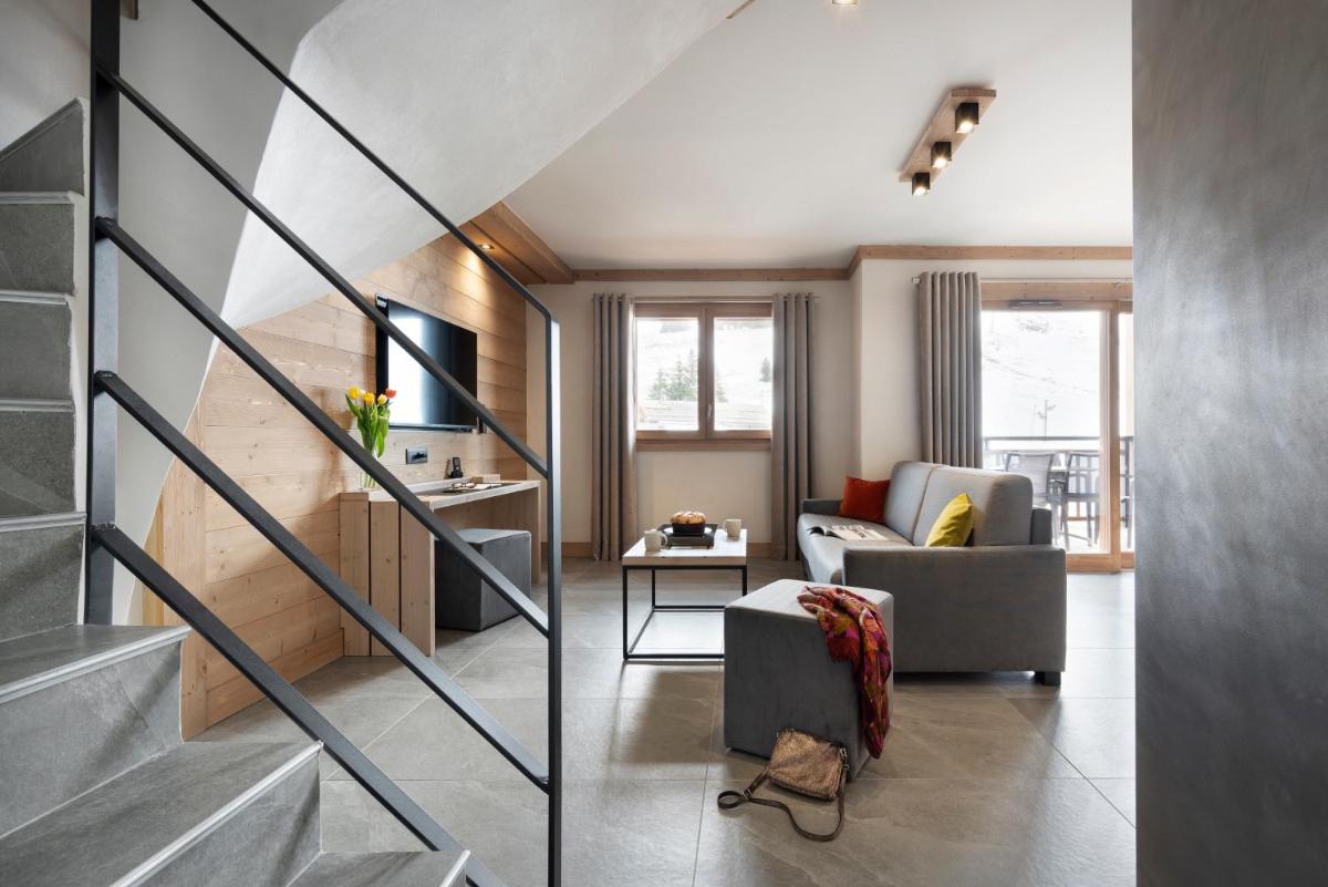 Coin salon dans l'établissement MGM Hôtels & Résidences - Résidence Le Hameau de l'Ours