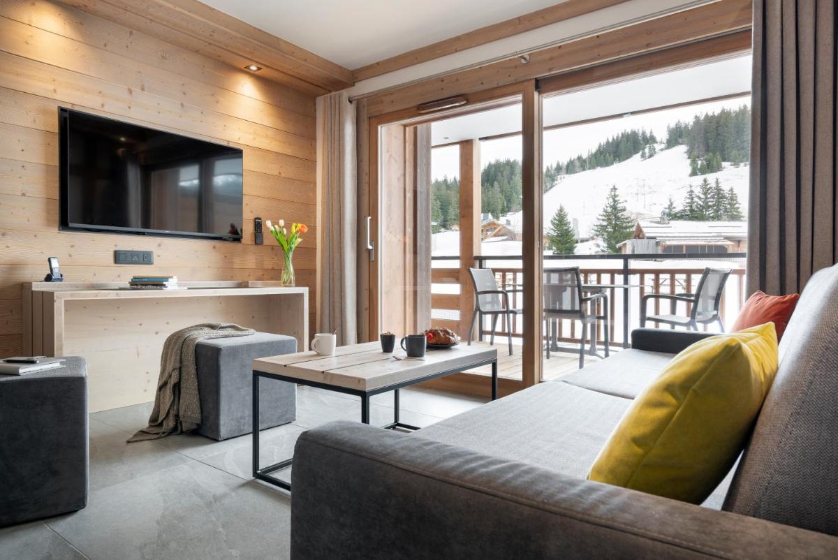 Coin salon dans l'établissement MGM Hôtels & Résidences - Résidence Le Hameau de l'Ours