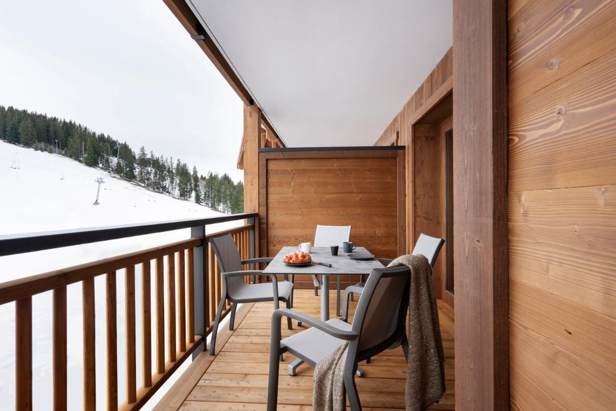 Balcon ou terrasse dans l'établissement MGM Hôtels & Résidences - Résidence Le Hameau de l'Ours