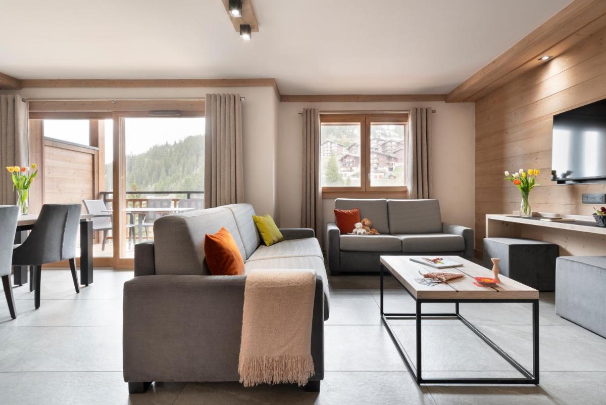 Coin salon dans l'établissement MGM Hôtels & Résidences - Résidence Le Hameau de l'Ours