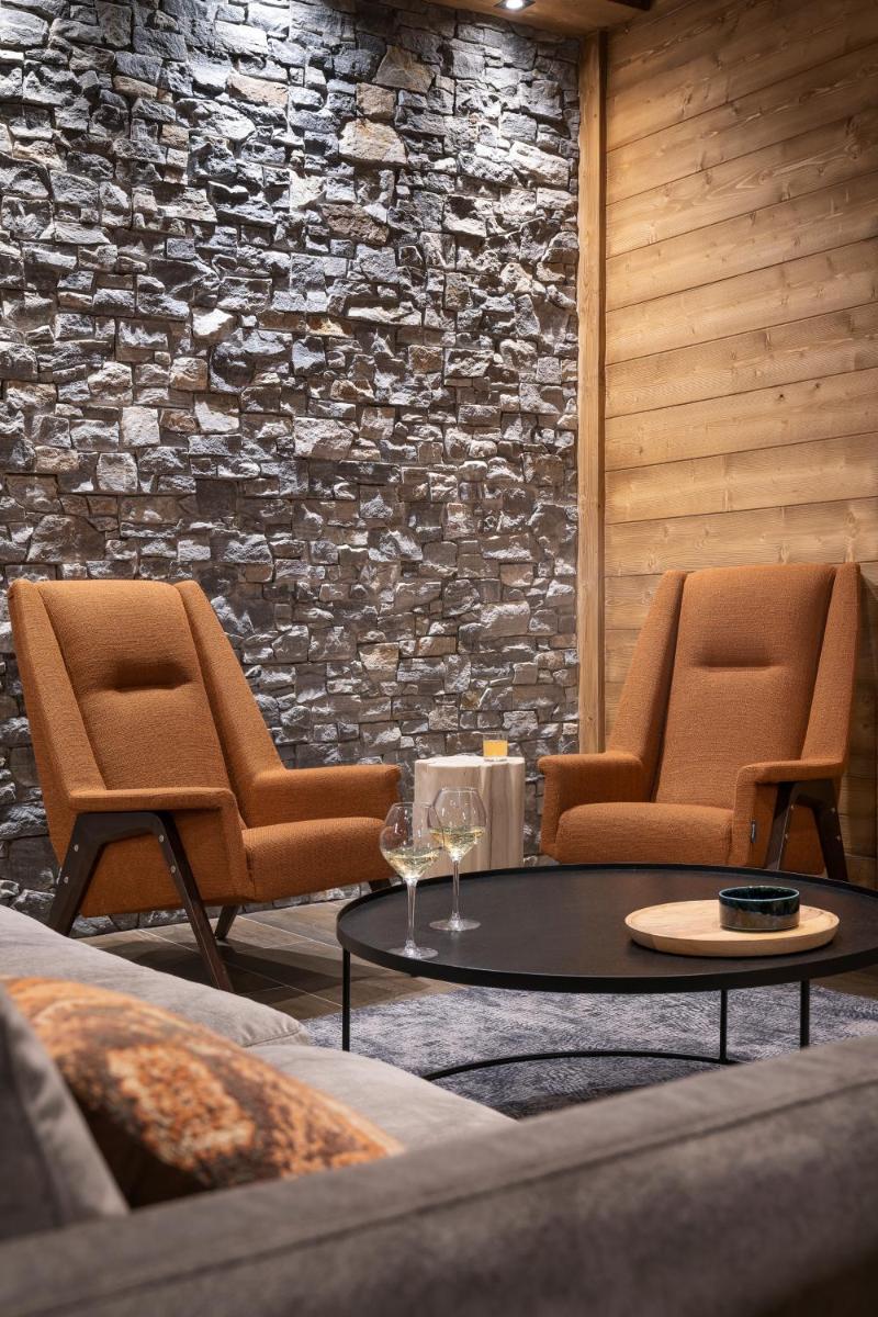 Coin salon dans l'établissement MGM Hôtels & Résidences - Résidence Chalets de Joy
