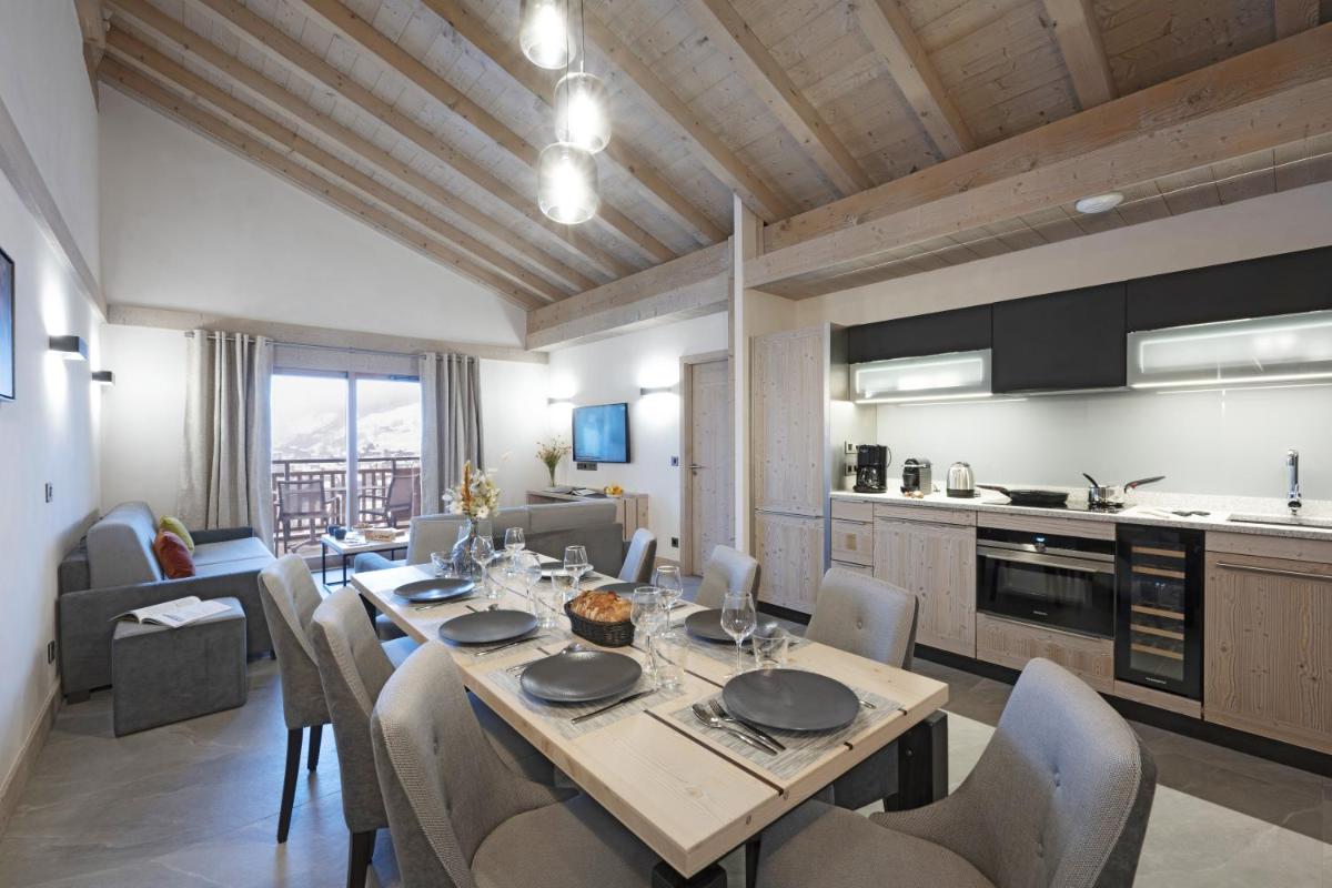 Cuisine ou kitchenette dans l'établissement MGM Hôtels & Résidences - Résidence Chalets de Joy
