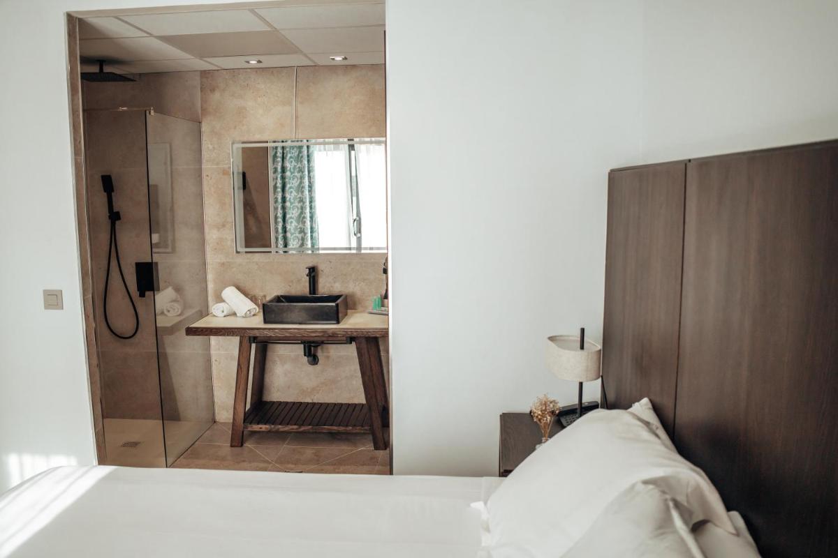Cama o camas de una habitación en Hotel Alba Seleqtta