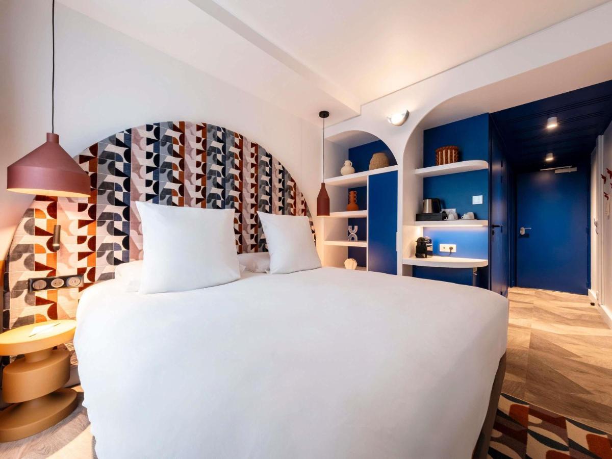 Un ou plusieurs lits dans un hébergement de l'établissement Mercure Quiberon Hotel