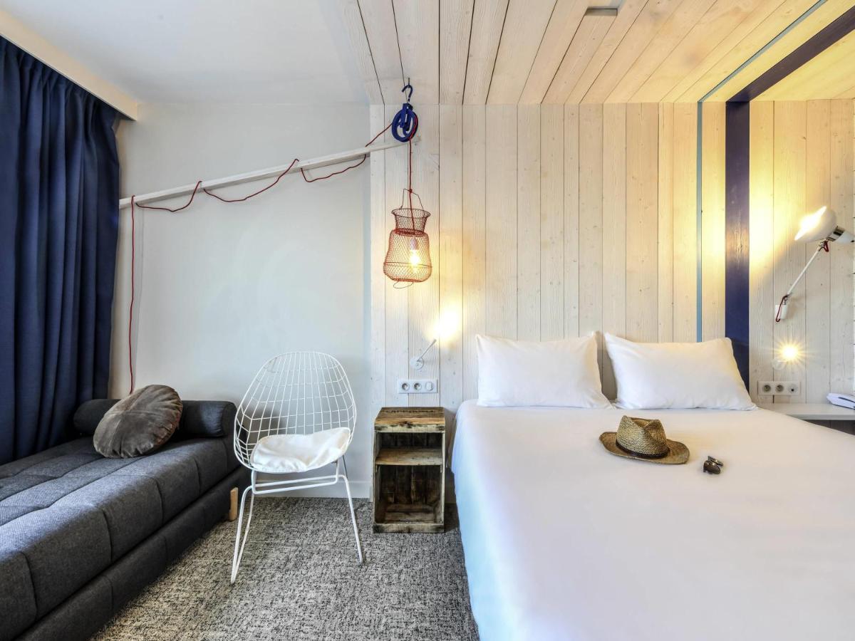 Un ou plusieurs lits dans un hébergement de l'établissement ibis styles La Rochelle Thalasso Chatelaillon